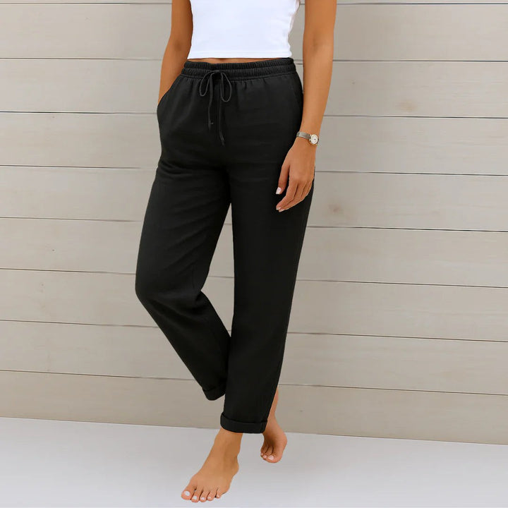 Black linen-blend trousers with elasticated waistband and turned-up hems