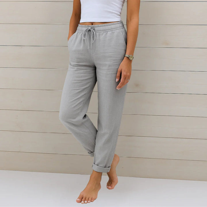 Grey linen-blend trousers with drawstring waist and cropped rolled cuffs