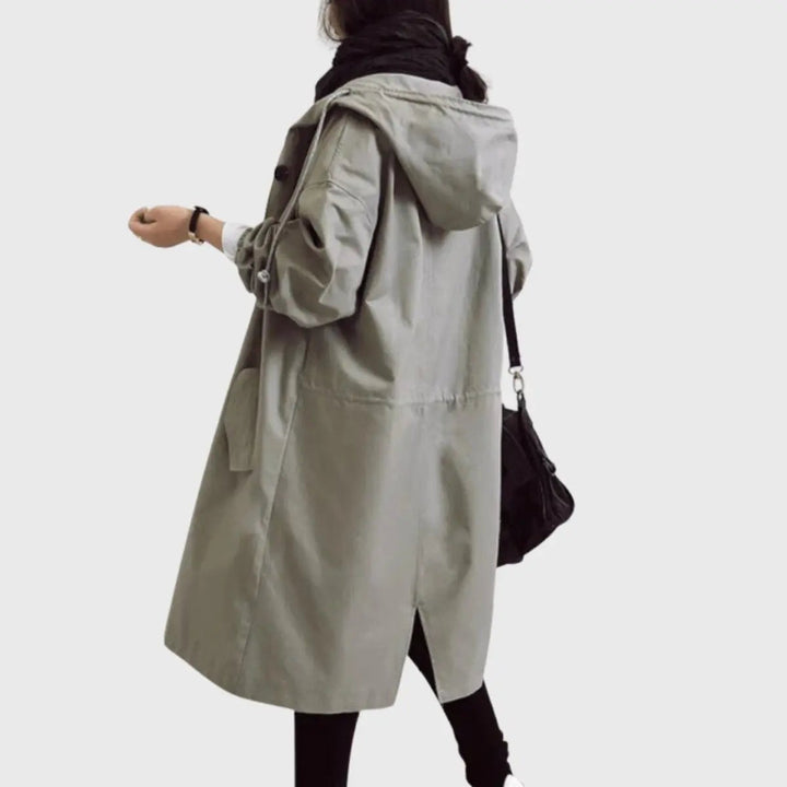 Sage-grey hooded trench coat rear view showing drawstring waist detail