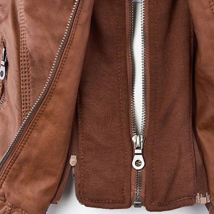 Close-up of tan faux-leather jacket zip fastening with jersey underlay