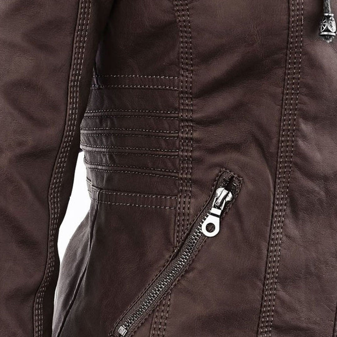 Close-up of brown faux-leather jacket pocket zip with braided pull tag