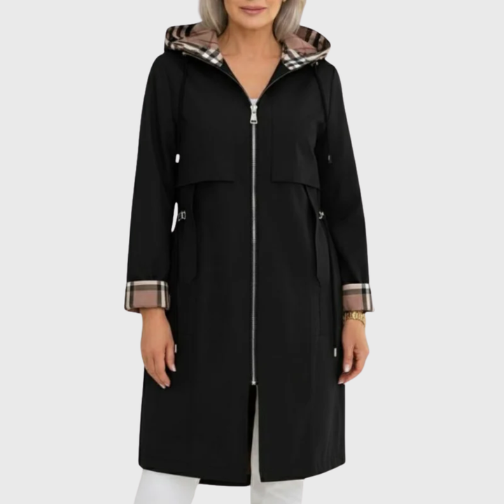 Black lightweight hooded trench coat featuring check-lined cuffs and zip fastening