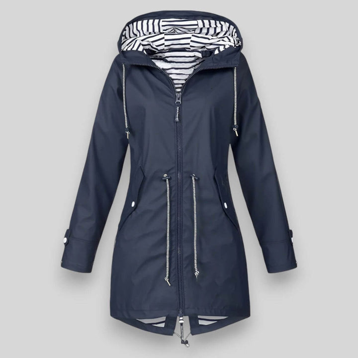 Navy hooded raincoat with striped lining and drawstring waist detail