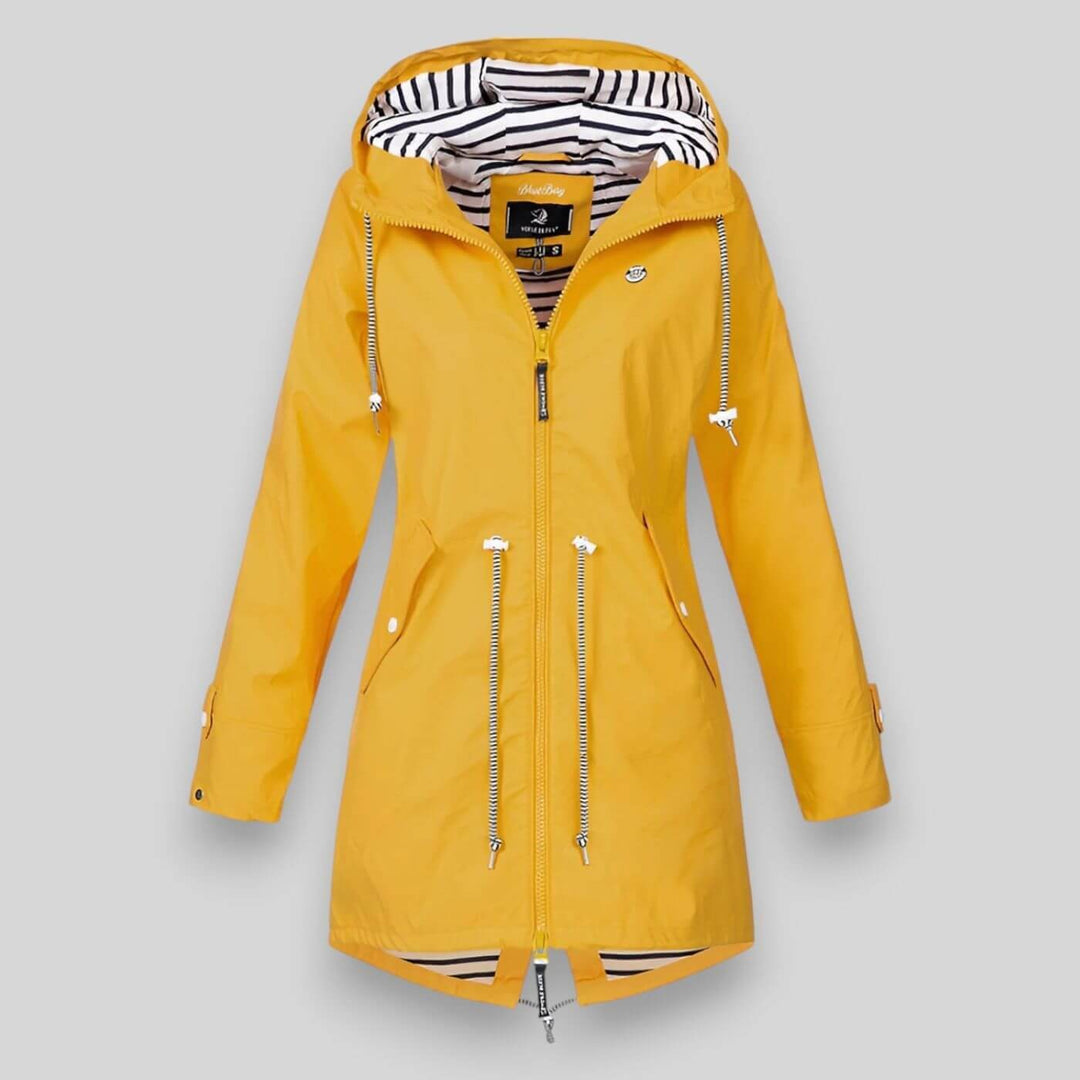 Mustard yellow waterproof parka with striped hood lining and zip pockets