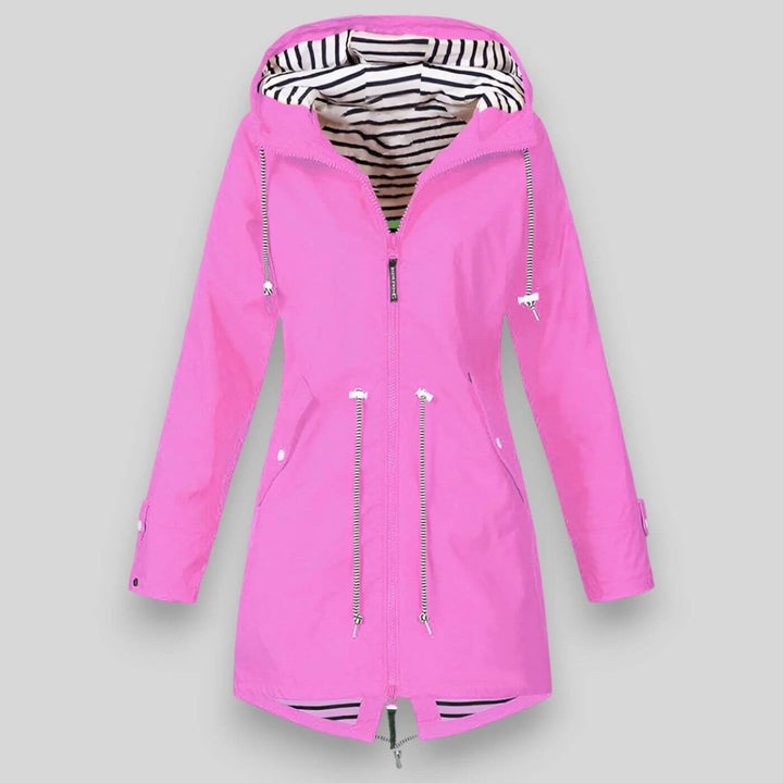 Bright pink longline raincoat with drawstring hood and striped lining