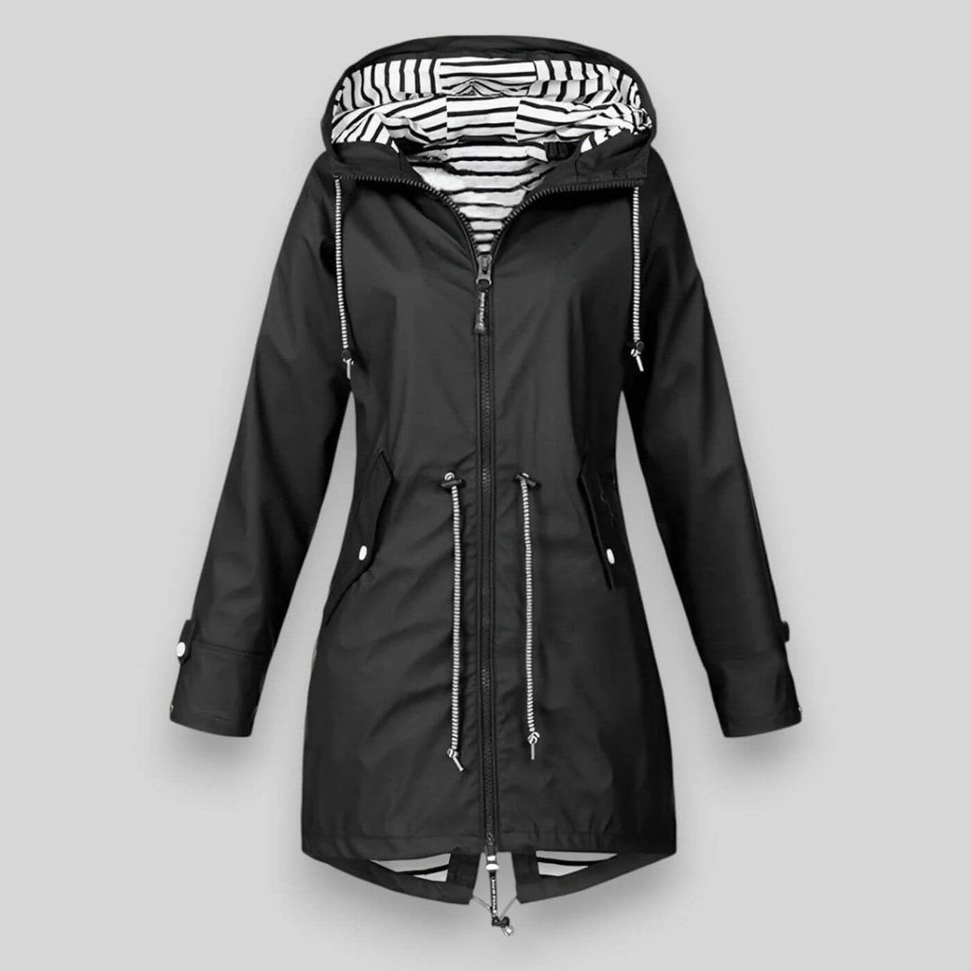 Black hooded rain jacket showing monochrome striped inner lining