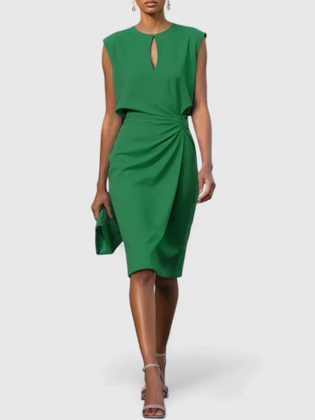 Emerald green ruched midi dress featuring keyhole neckline and cap sleeves