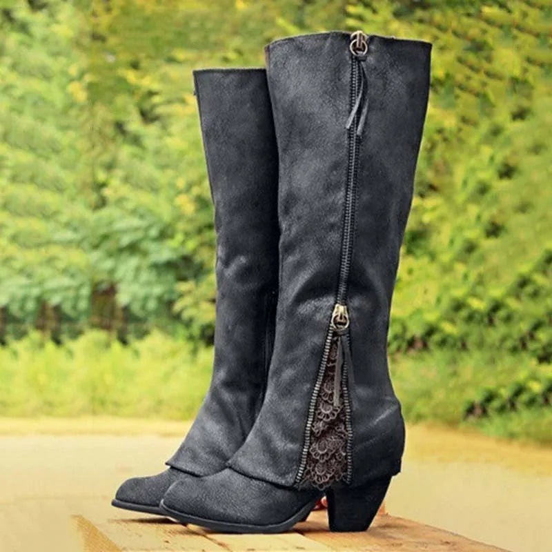 Black knee-high boots featuring block heel and lace zip trim
