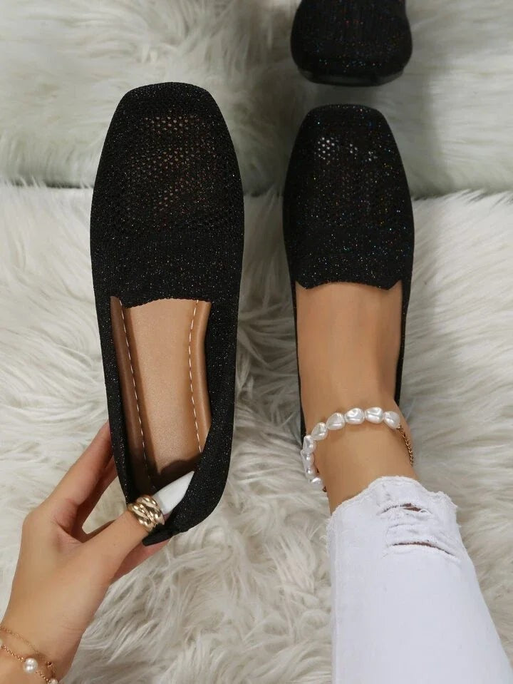 Black glittery knit flat loafers with perforated square toe design