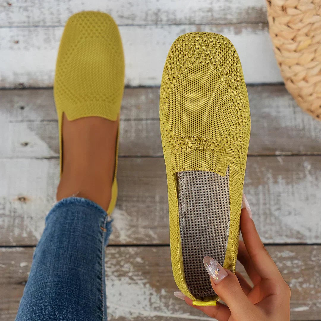 Mustard knitted slip-on loafers showing textured woven insole detail