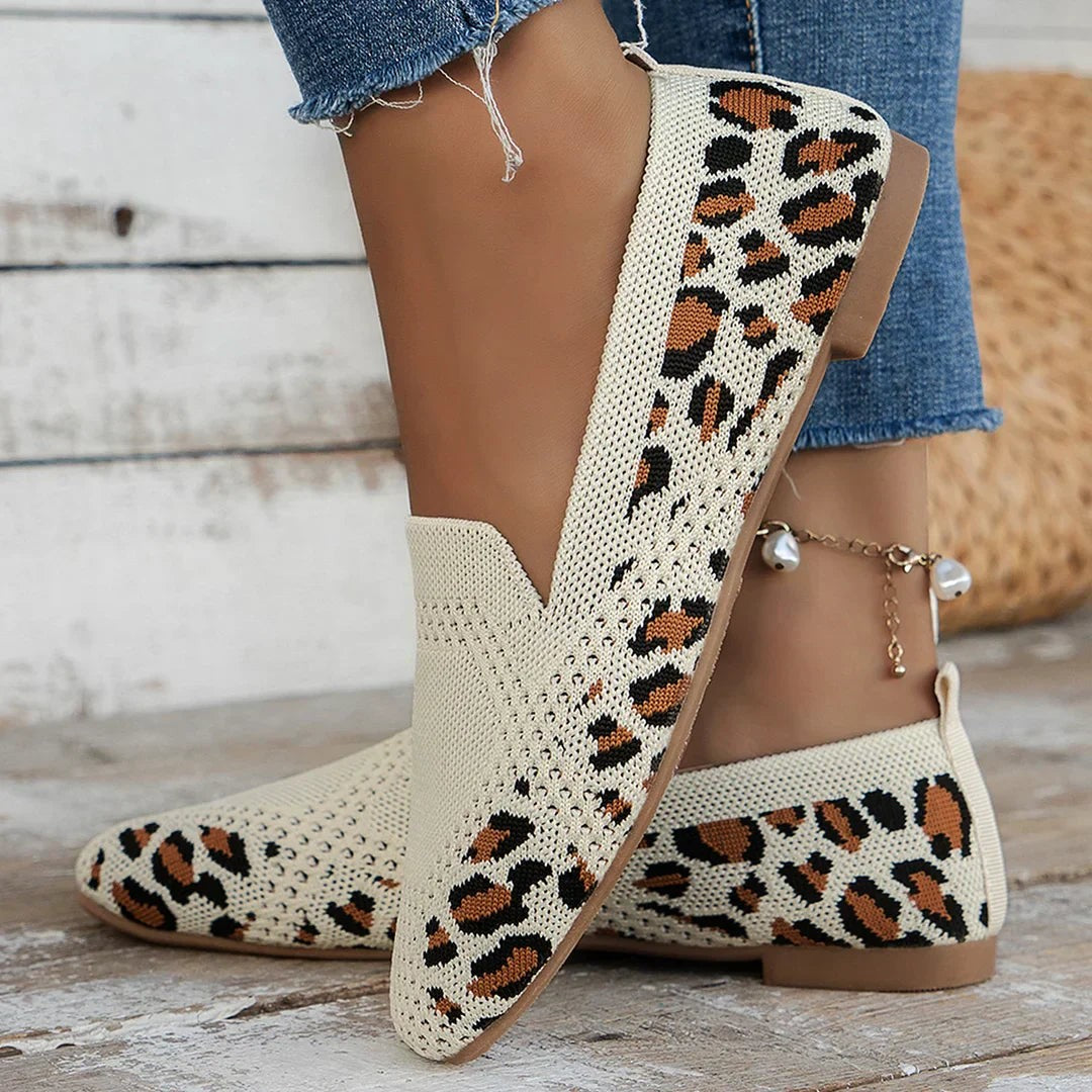 Cream knitted loafers featuring leopard print panel and contrast sole