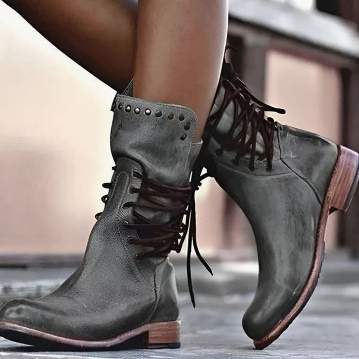 Grey leather lace-up ankle boots with studded trim and low block heel