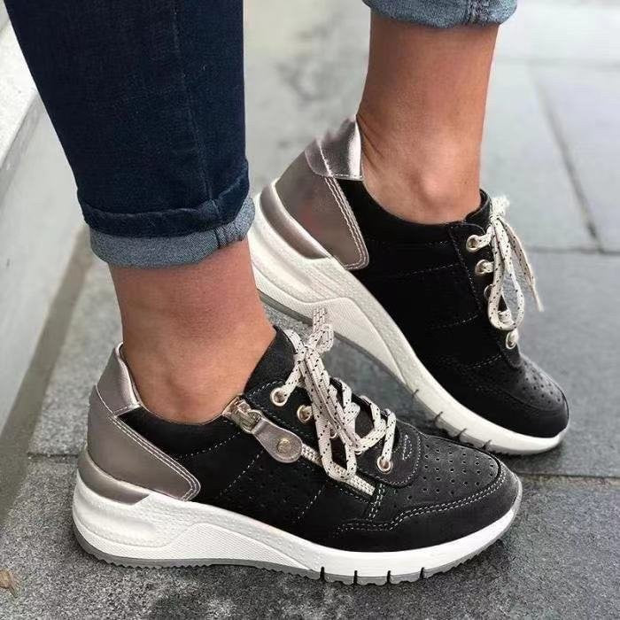 Black suede lace-up trainers with metallic bronze heel accent detail
