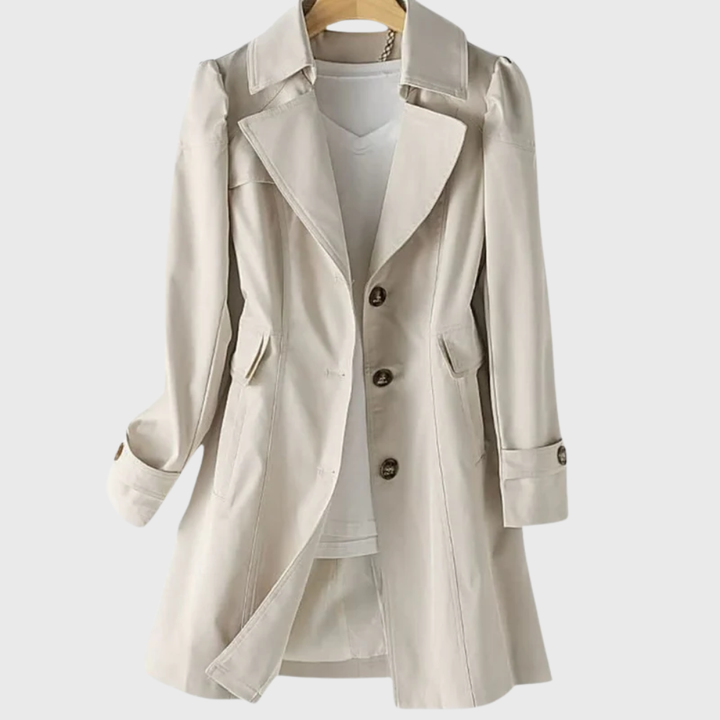 Stone beige trench coat with notched lapel and button cuffs, worn open