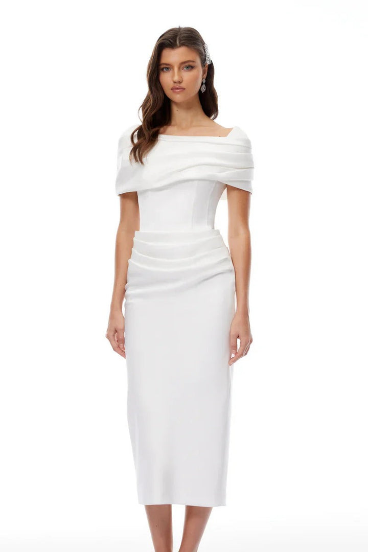 White off-shoulder midi dress styled with ruched waist and sleek updo