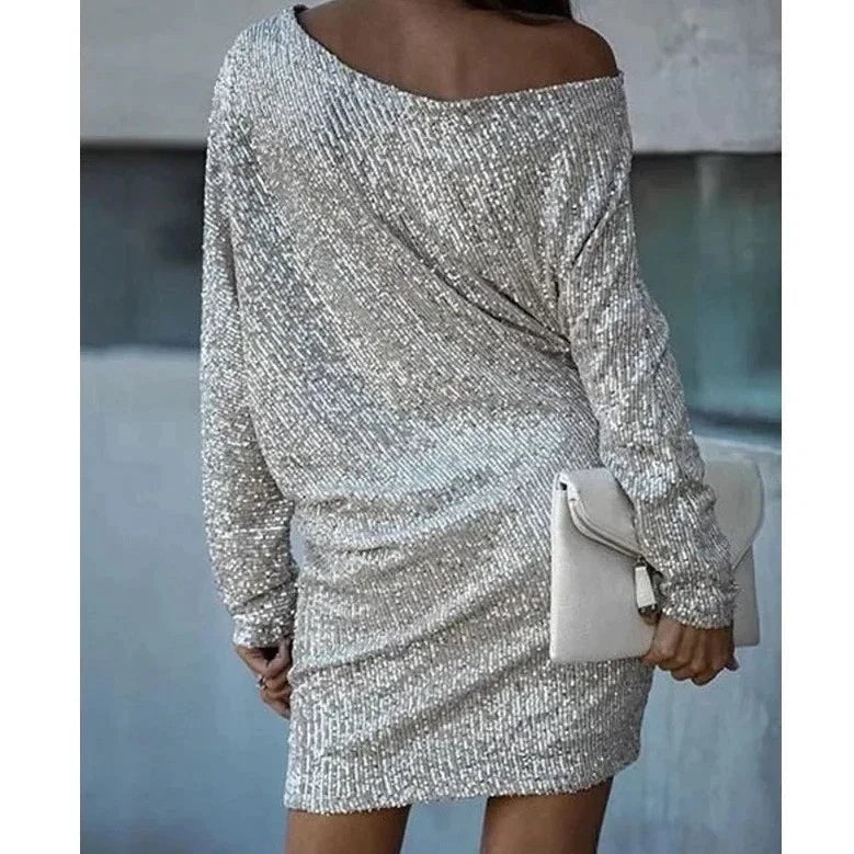 Silver sequin mini dress with loose batwing sleeves, back view