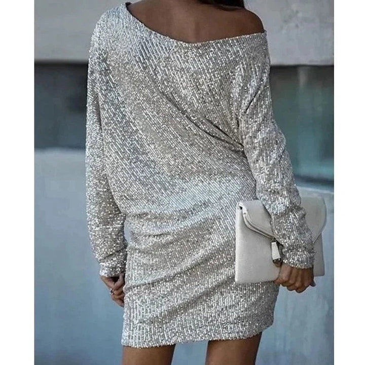 Silver sequin mini dress with loose batwing sleeves, back view