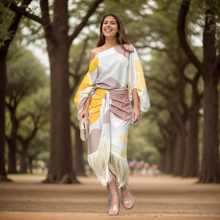 Colour-block midi dress with fringe detail, paired with clear strap heels