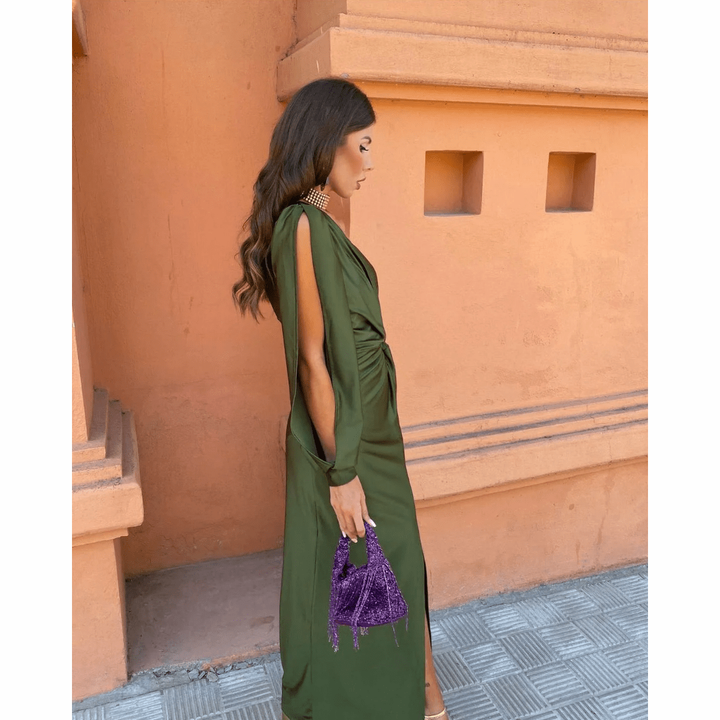 Olive satin gown with slit sleeve styled with a purple beaded bag