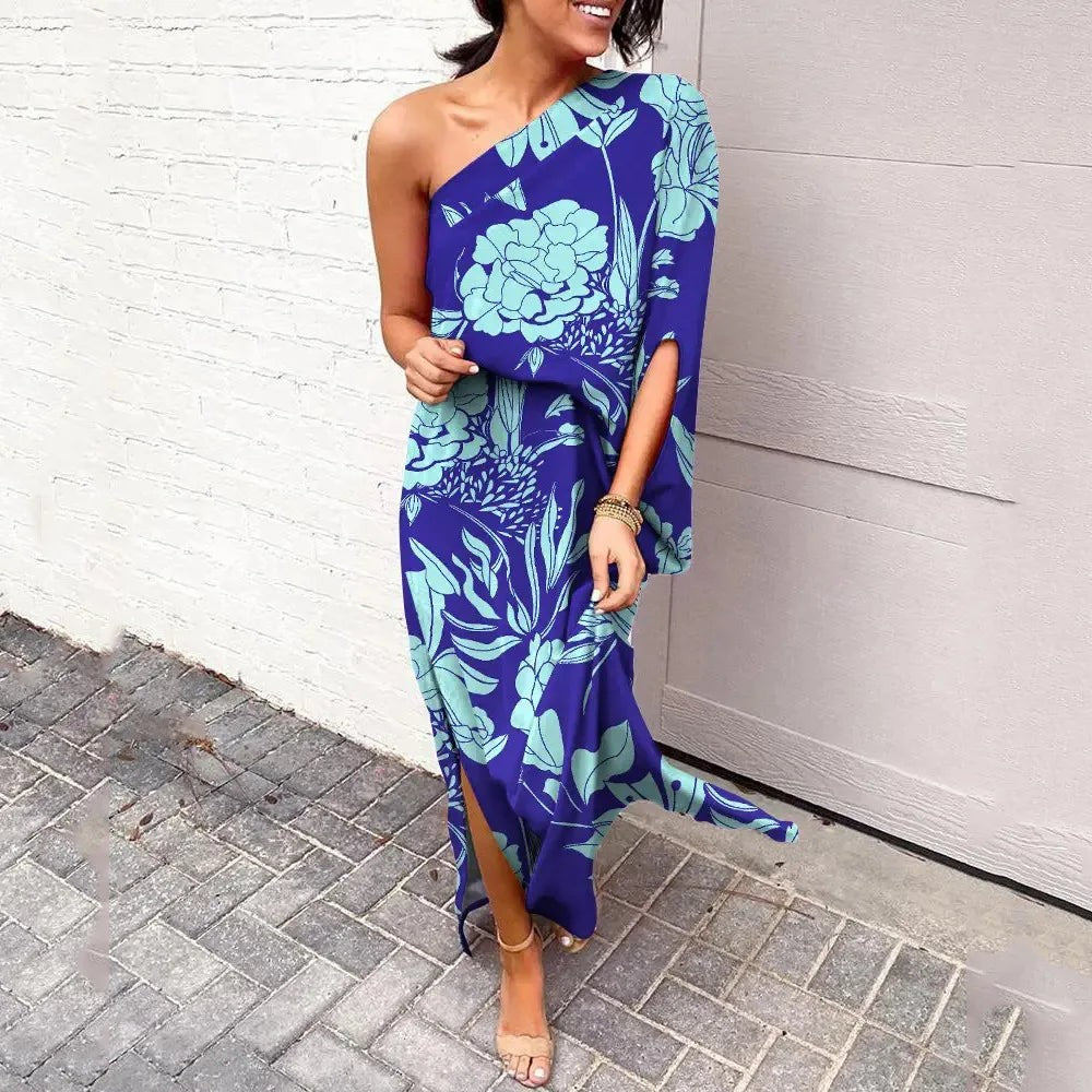 Blue floral one-shoulder maxi dress with draped batwing sleeve and side split