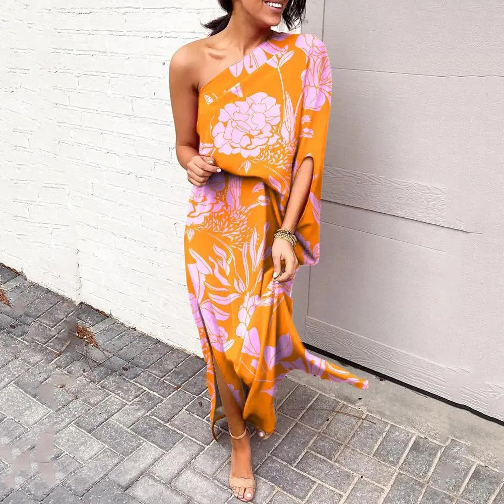 Orange and pink floral one-shoulder maxi dress with side slit hemline