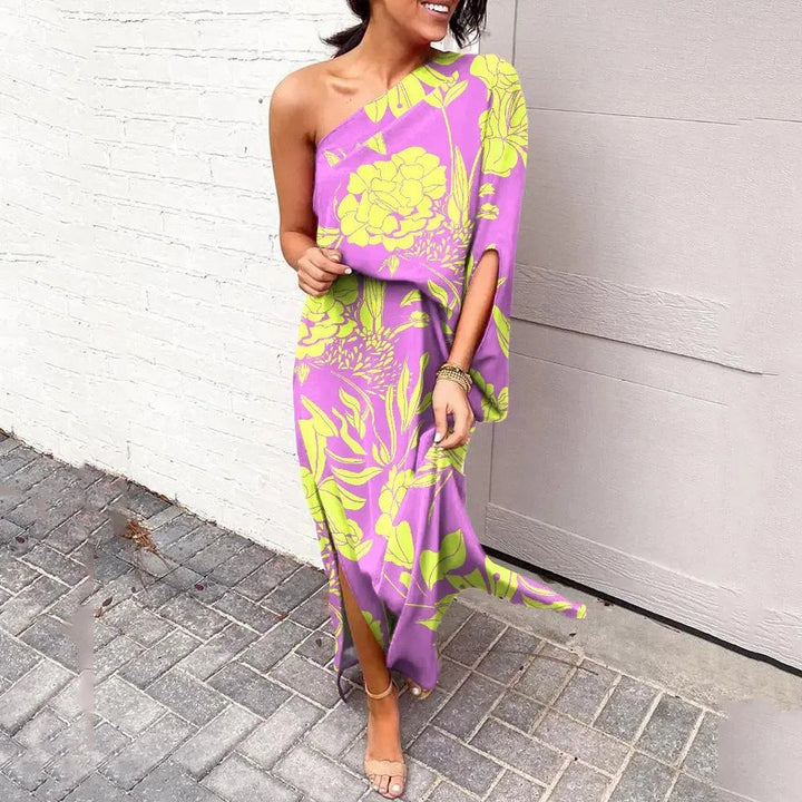 Purple and yellow floral one-shoulder maxi dress with flowing batwing sleeve