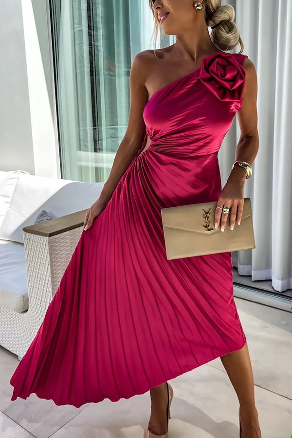 One-shoulder magenta pleated maxi dress with rosette shoulder detail and cut-out waist