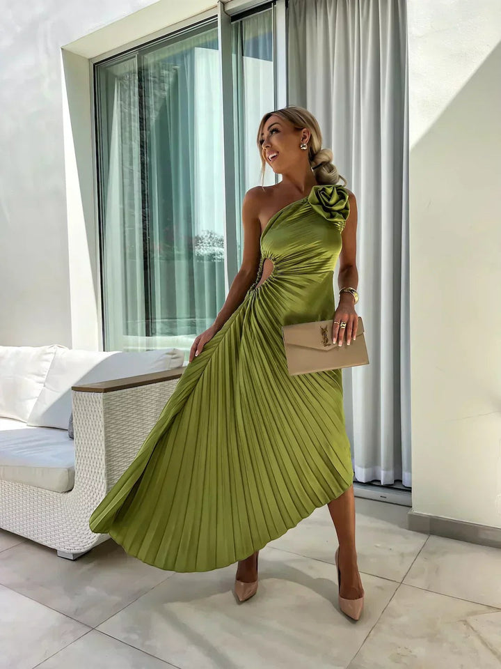 Olive green pleated one-shoulder dress with rosette detail and cut-out waist