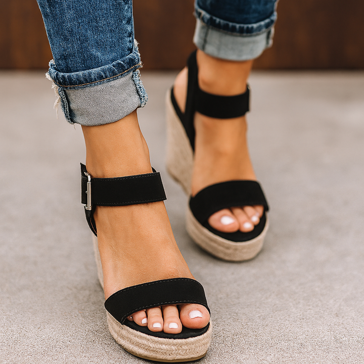 Black suede espadrille wedge sandals with ankle strap and buckle detail