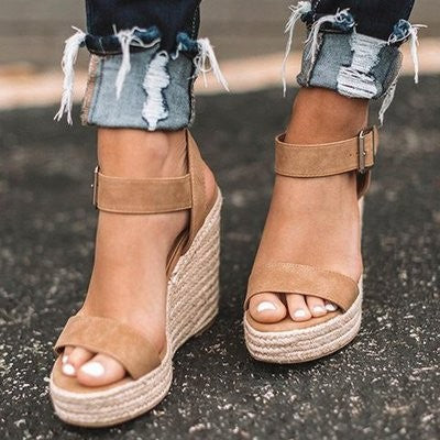 Tan suede espadrille wedge sandals with buckled ankle strap