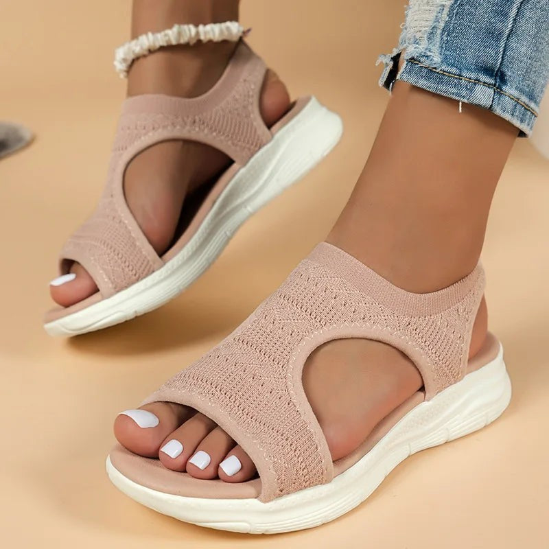 Peep-toe pink knit sandals with cut-out ankle straps and chunky white sole
