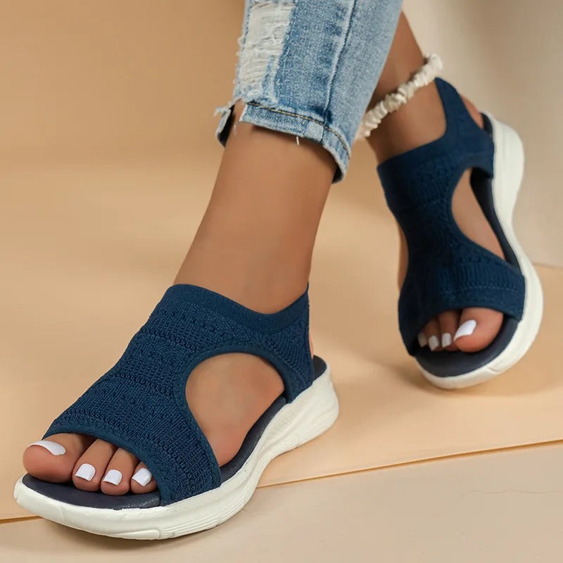 Navy knitted orthopedic sandals with open toe and cut-out side detailing