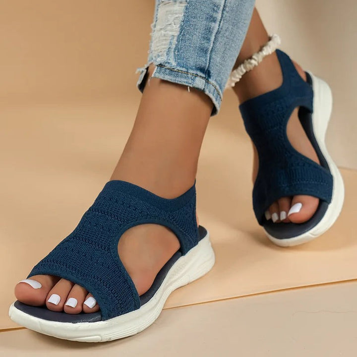 Navy knitted orthopedic sandals with open toe and cut-out side detailing