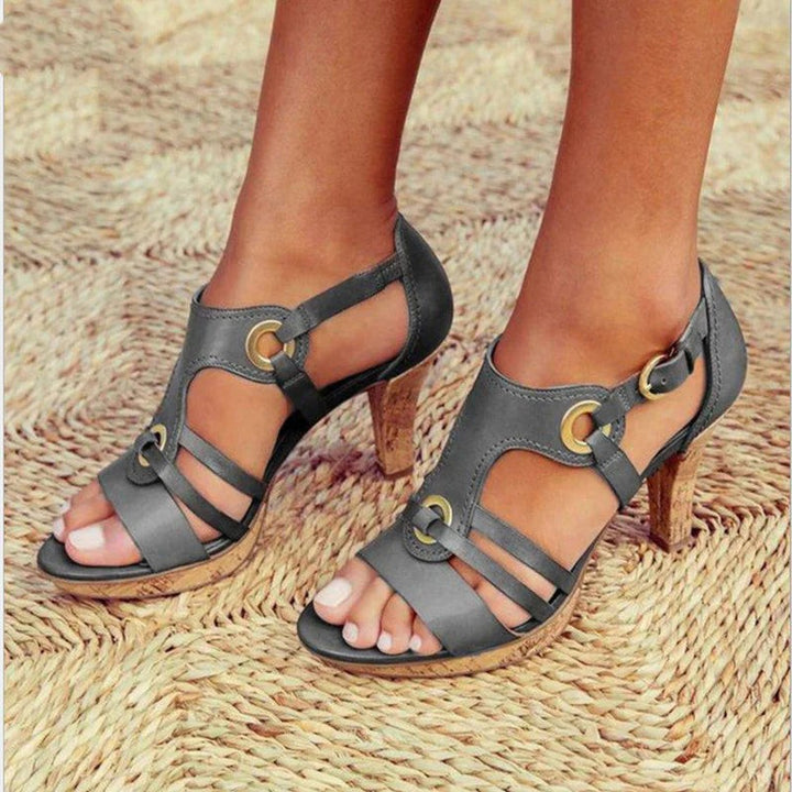 Grey leather caged heeled sandals with cork platform sole and buckle ankle strap