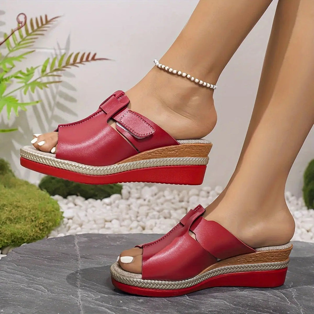 Yellow leather wedge sandals with cut-out strap detail and braided base