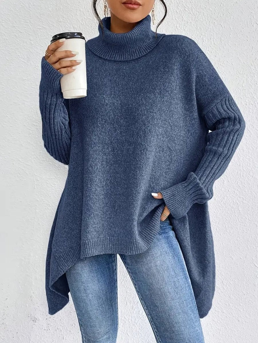 Denim-blue oversized turtleneck jumper with ribbed sleeves and asymmetric hem