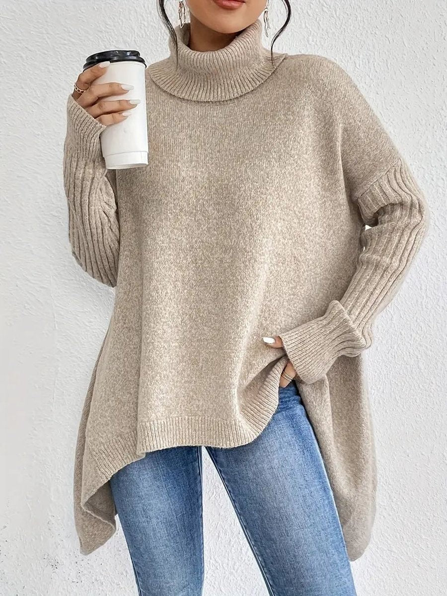 Oatmeal beige oversized turtleneck jumper paired with skinny jeans