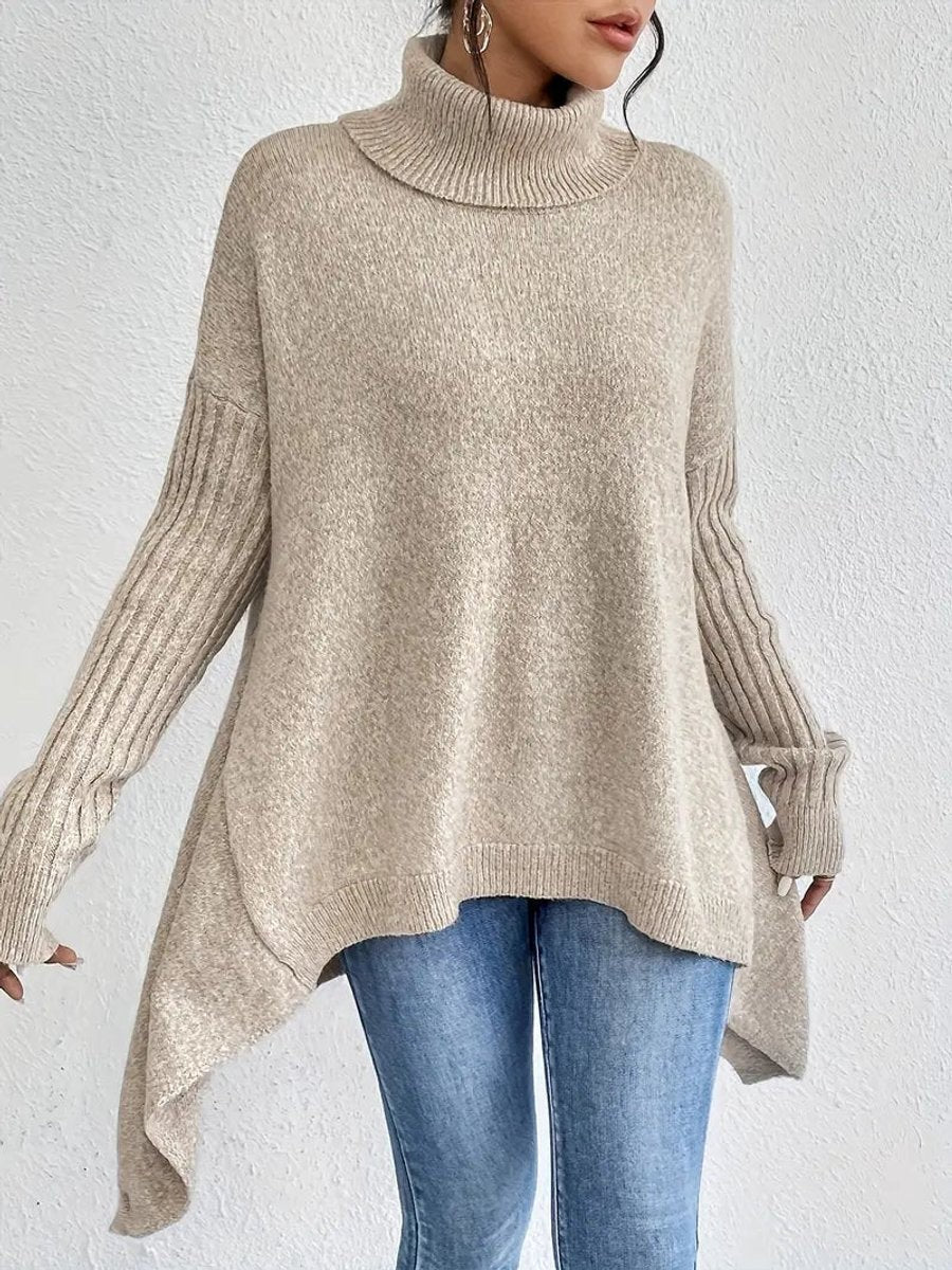 Close-up of beige turtleneck jumper highlighting chunky ribbed sleeve detail