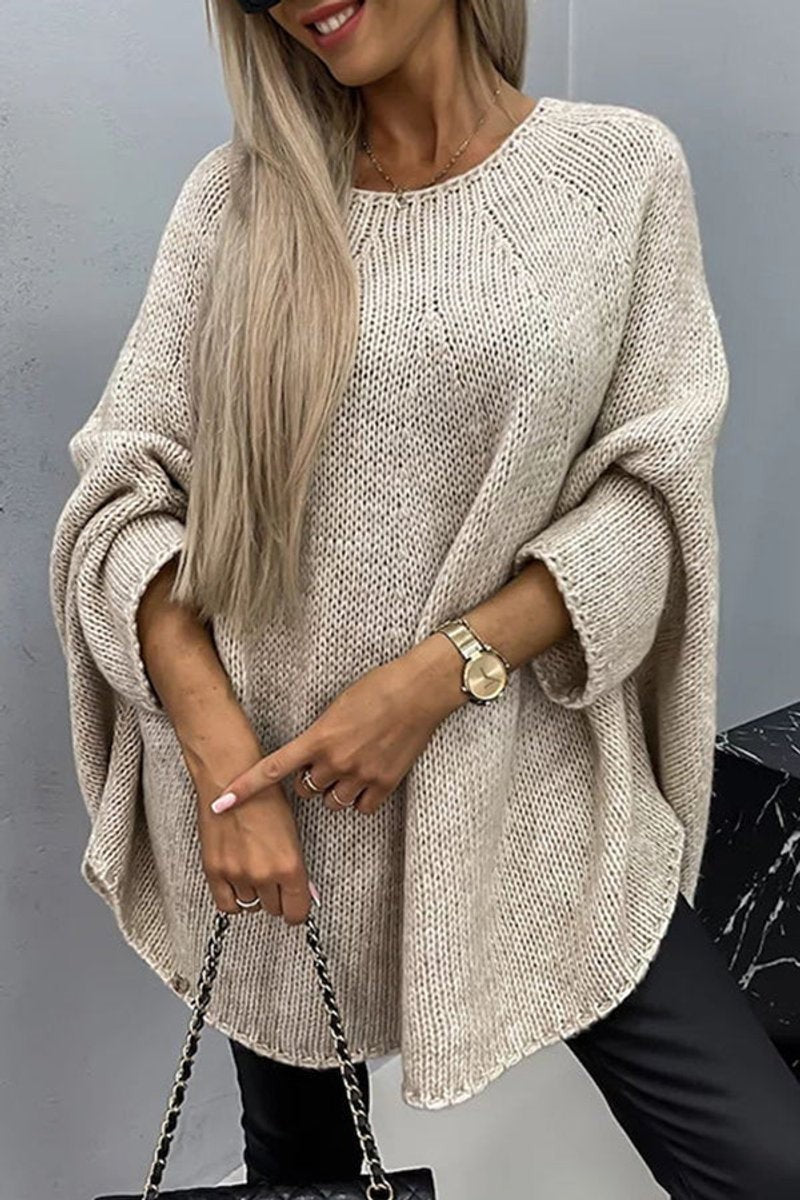 Beige oversized knit jumper with batwing sleeves and round neckline