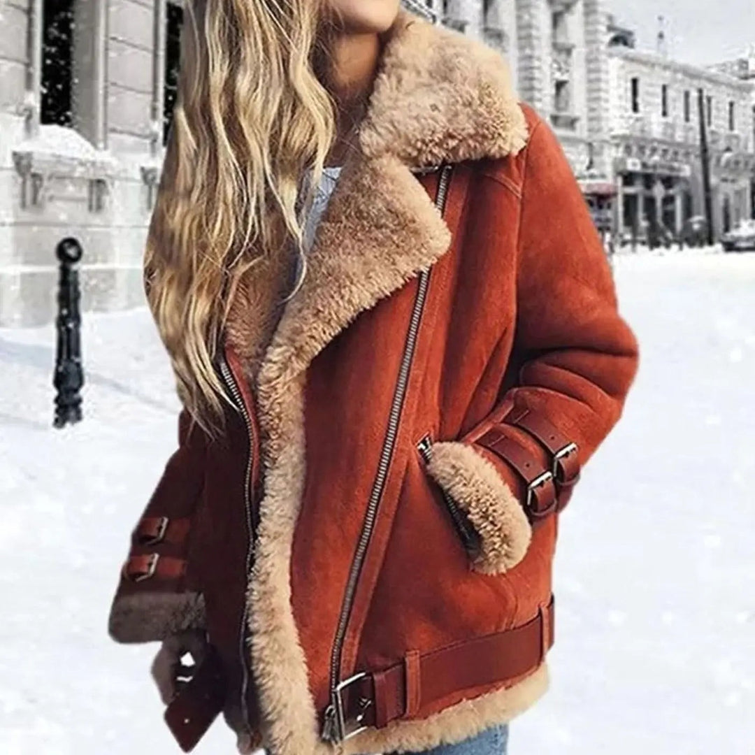 Rust orange suede moto jacket with shearling collar and buckle cuffs