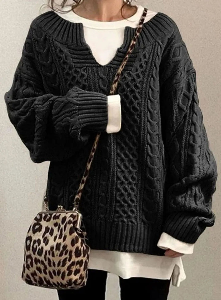 Charcoal grey cable knit jumper with dropped shoulders and layered vest