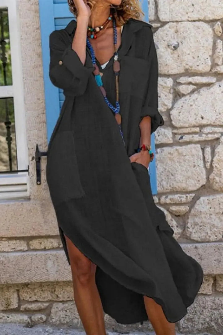Black linen oversized shirt dress with roll-up sleeves and side split