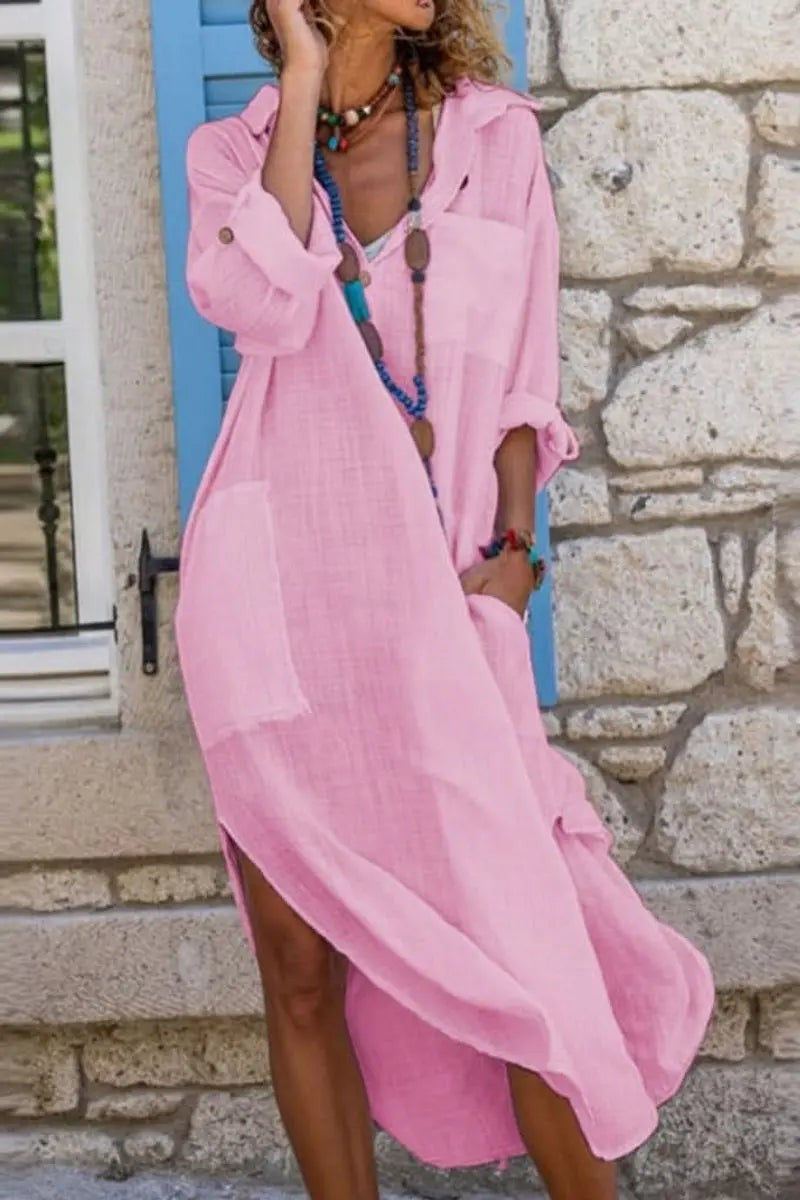 Pink linen oversized shirt dress with roll-up sleeves and relaxed fit