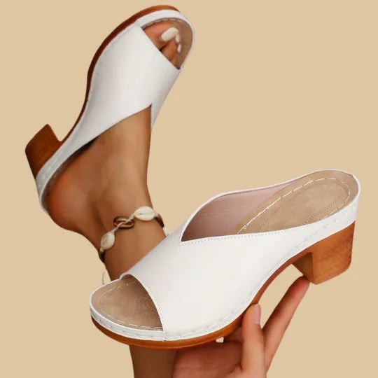 White leather peep-toe mule sandals with contrast stitching and wooden block heel