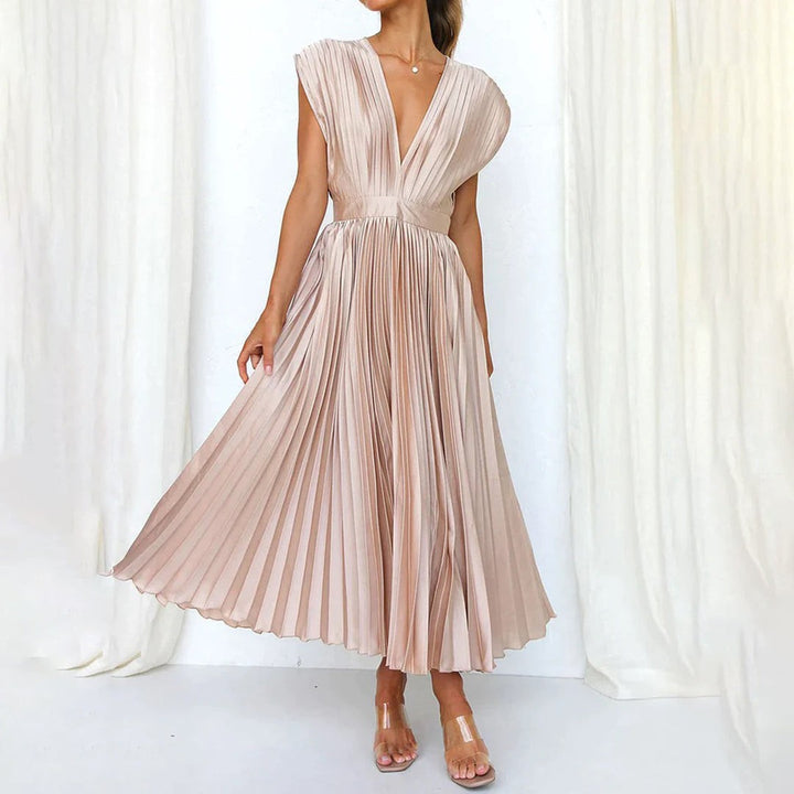 Champagne pleated satin midi dress with plunging V-neck and cap sleeves