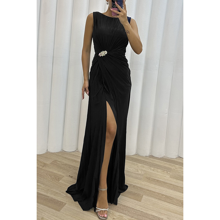 Black pleated maxi dress with sparkly waist brooch and high side split