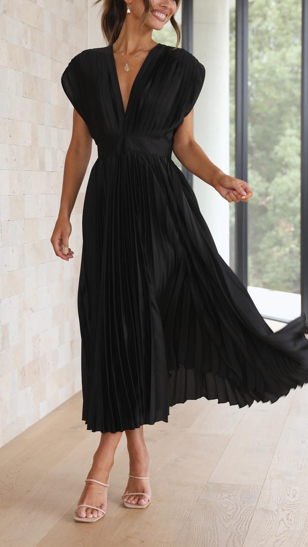 Sage green pleated satin midi dress with plunging neckline and cap sleeves