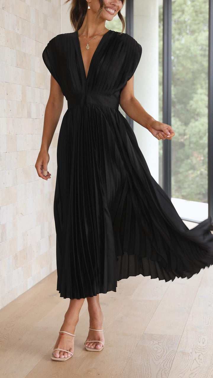 Sage green pleated satin midi dress with plunging neckline and cap sleeves