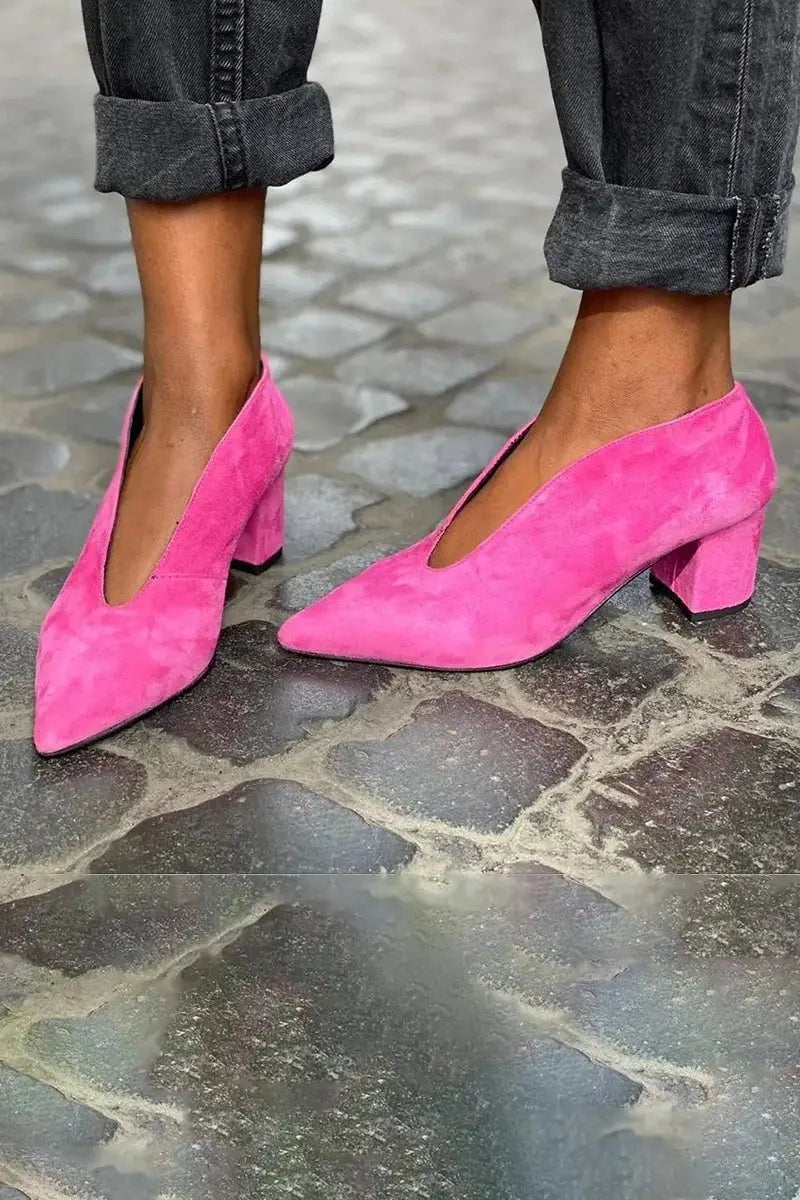 Pink suede block heel court shoes with pointed toe and deep V-cut vamp