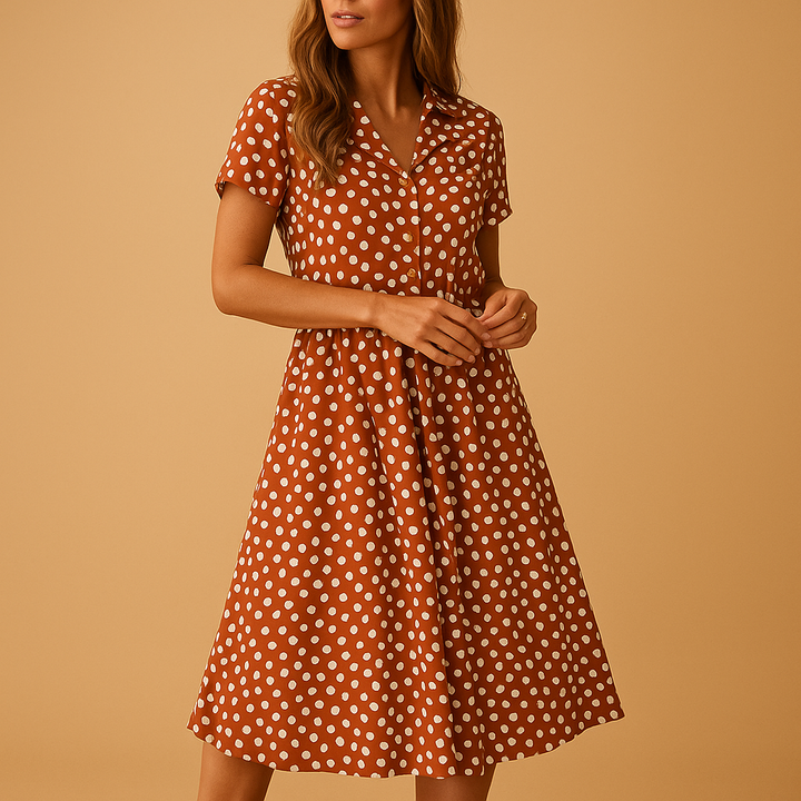 Rust-brown polka dot midi dress with collared shirt neckline and flared skirt